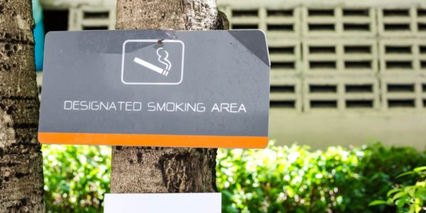 What are the laws around smoking on company property in the UK?